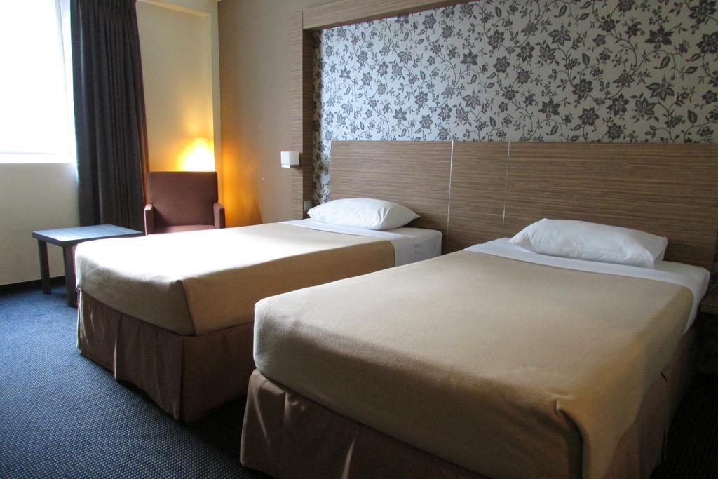 Strand Hotel Сингапур Номер фото