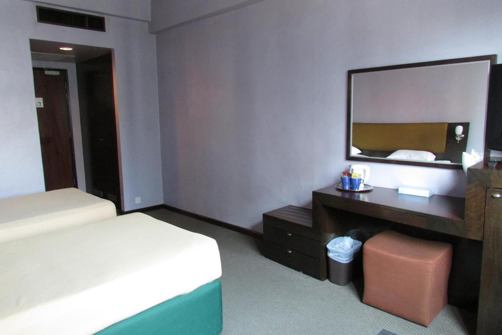 Strand Hotel Сингапур Номер фото