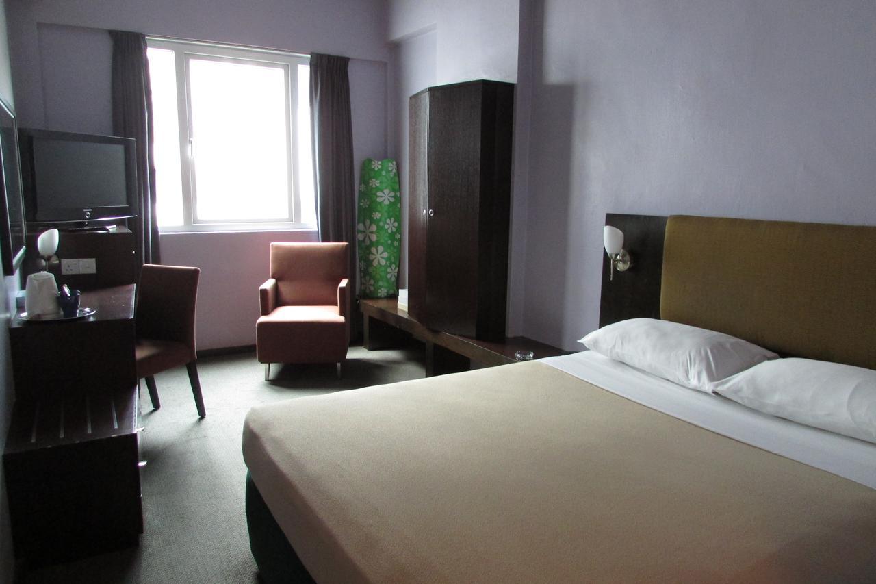 Strand Hotel Сингапур Номер фото